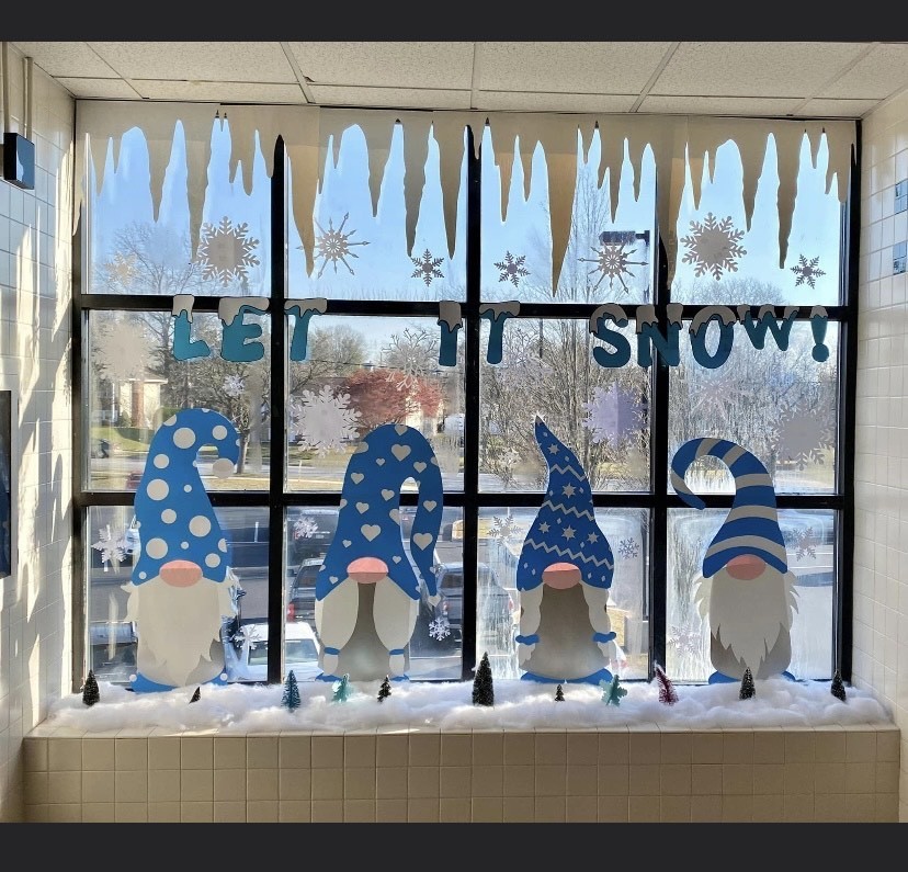 Snow and gnomes in a window